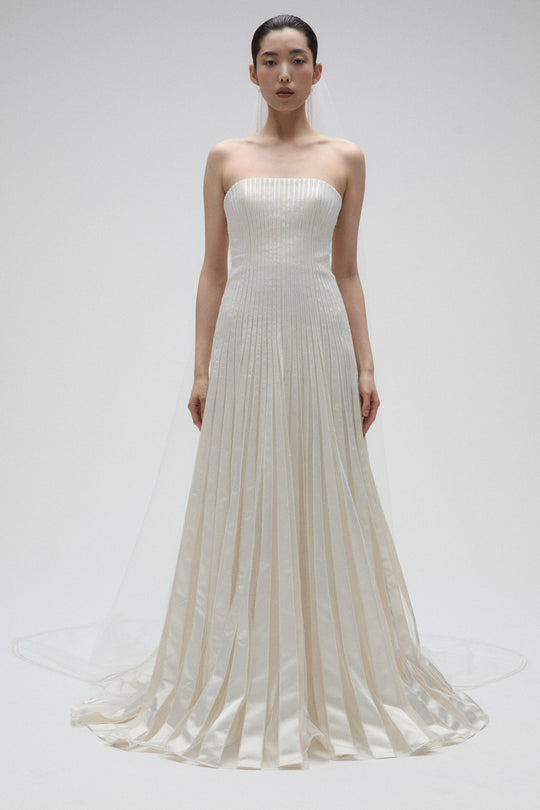 Mimosa, $9,995, dress from Collection Bridal by Amsale, Fabric: duchess-satin