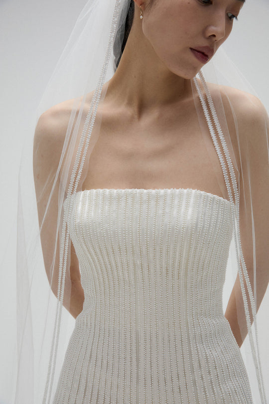 Mimosa, $9,995, dress from Collection Bridal by Amsale, Fabric: duchess-satin