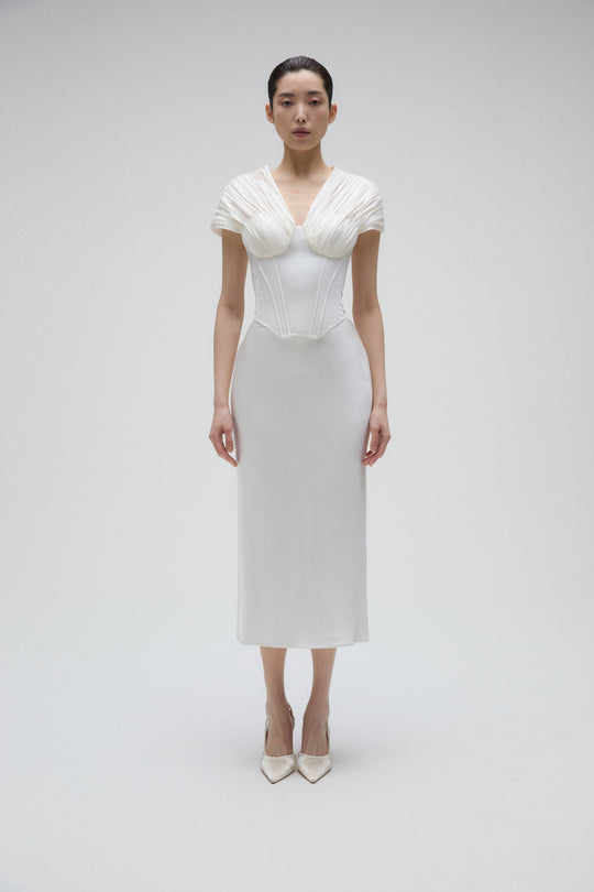 Tempest, $5,695, dress from Collection Bridal by Amsale, Fabric: liquid-satin
