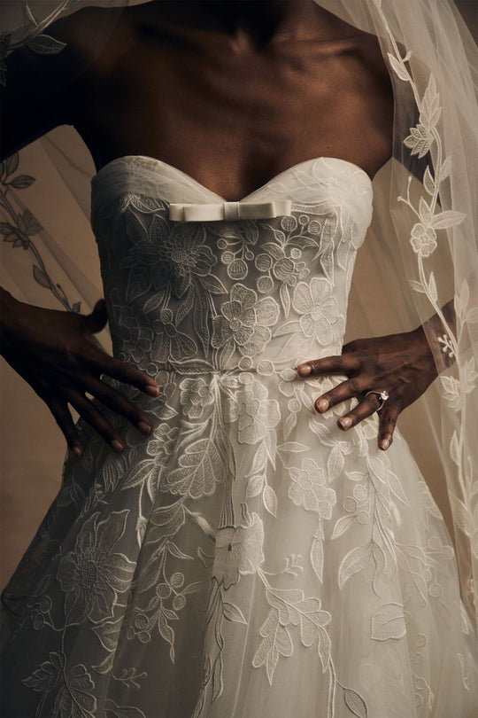 Lupe, $8,995, dress from Collection Bridal by Amsale, Fabric: floral-embroidery