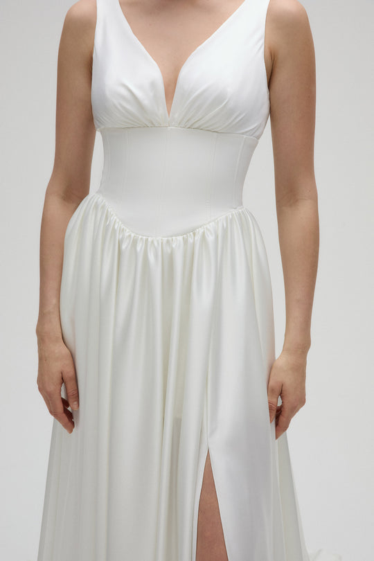 Ahrens, $2,595, dress from Collection Bridal by Nouvelle Amsale, Fabric: satin
