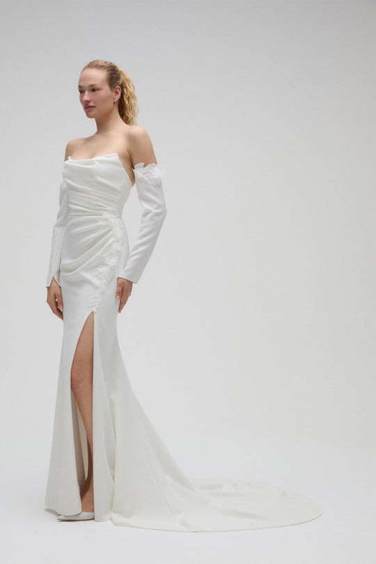 Audra, $2,495, dress from Collection Bridal by Nouvelle Amsale, Fabric: crepe