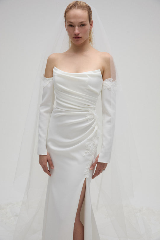 Audra, $2,495, dress from Collection Bridal by Nouvelle Amsale, Fabric: crepe