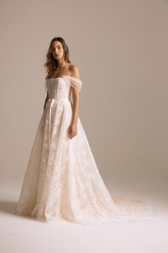 Calypso, $4,395, dress from Collection Bridal by Nouvelle Amsale, Fabric: floral-embroidered-tulle