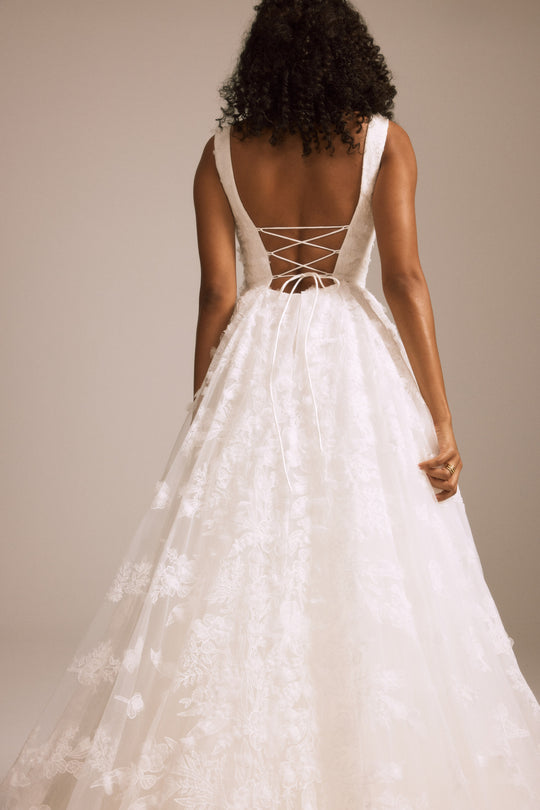 Elodie, $4,995, dress from Collection Bridal by Nouvelle Amsale