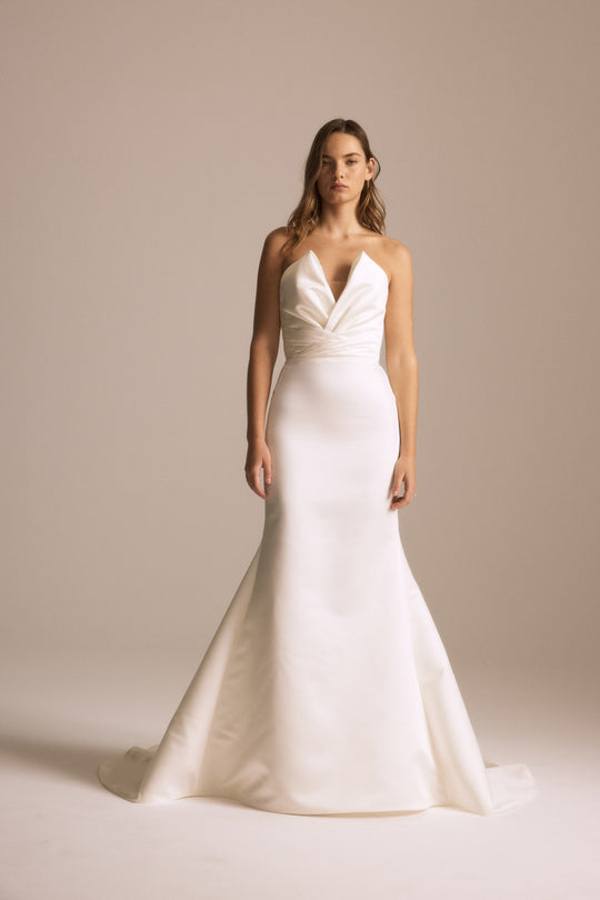 Indigo, $2,795, dress from Collection Bridal by Nouvelle Amsale, Fabric: duchess-satin