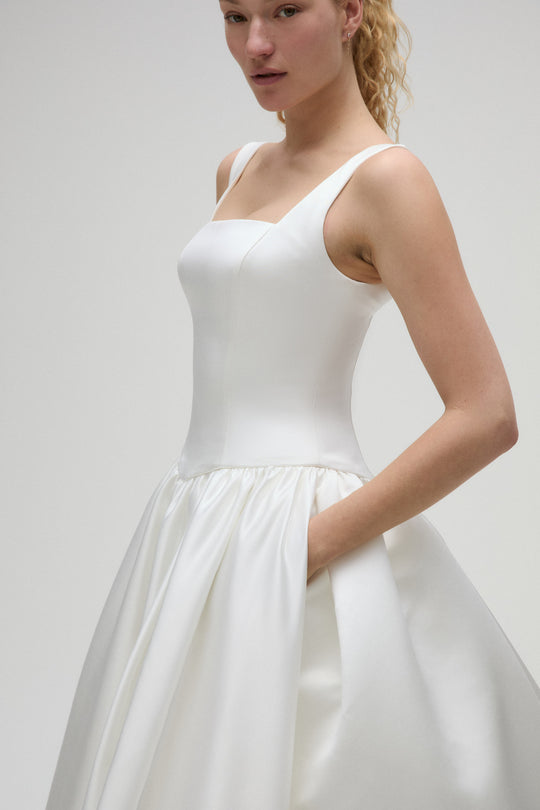 Jackson, $2,750, dress from Collection Bridal by Nouvelle Amsale, Fabric: satin