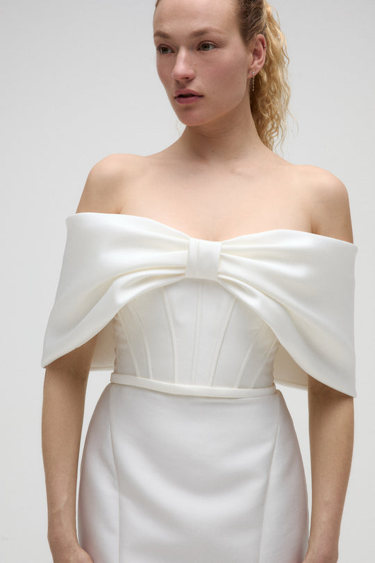 Joni, $2,895, dress from Collection Bridal by Nouvelle Amsale, Fabric: mikado