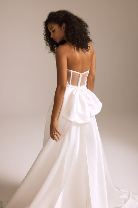 Lincoln, $2,995, dress from Collection Bridal by Nouvelle Amsale, Fabric: satin
