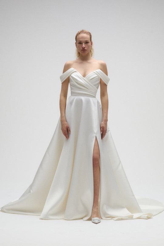 Marlene, $2,895, dress from Collection Bridal by Nouvelle Amsale, Fabric: mikado