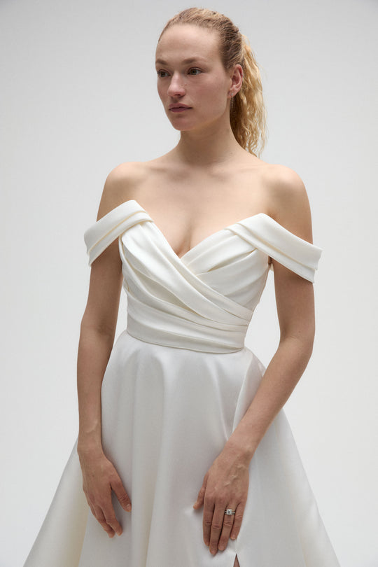 Marlene, $2,895, dress from Collection Bridal by Nouvelle Amsale, Fabric: mikado