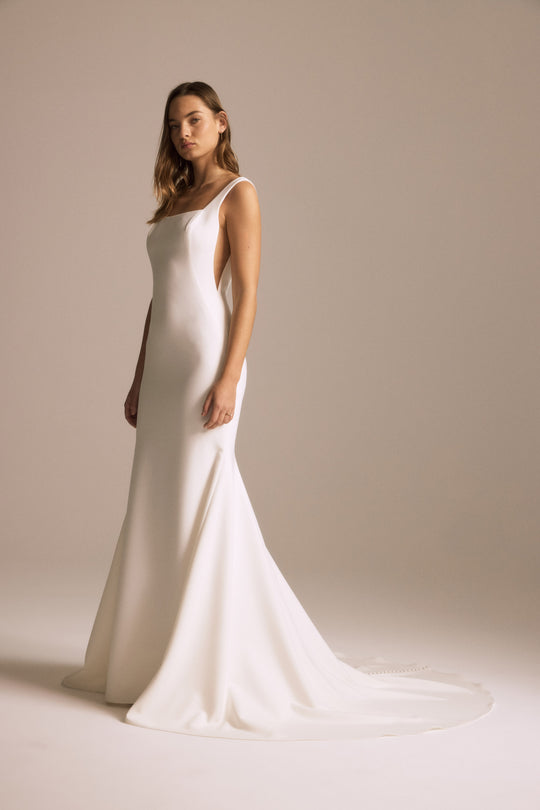 Nada, $2,595, dress from Collection Bridal by Nouvelle Amsale, Fabric: crepe