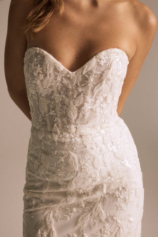 Oakley, $4,295, dress from Collection Bridal by Nouvelle Amsale, Fabric: beaded-tulle
