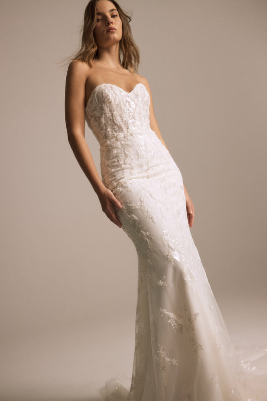 Oakley, $4,295, dress from Collection Bridal by Nouvelle Amsale, Fabric: beaded-tulle