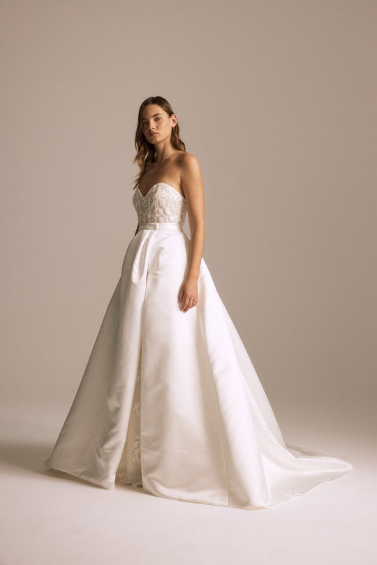 Duchess Satin Overskirt, $1,995, dress from Collection Bridal by Nouvelle Amsale, Fabric: duchess-satin