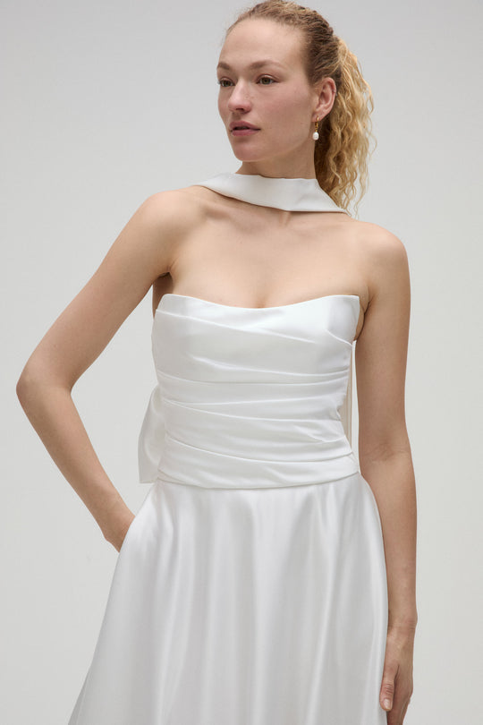 Oli, $2,675, dress from Collection Bridal by Nouvelle Amsale, Fabric: satin