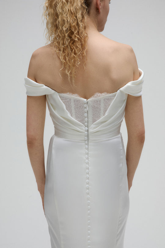 Shara, $2,595, dress from Collection Bridal by Nouvelle Amsale, Fabric: satin