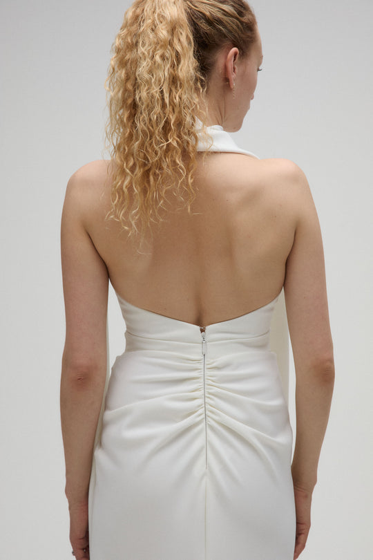 Tully, $2,250, dress from Collection Bridal by Nouvelle Amsale, Fabric: crepe