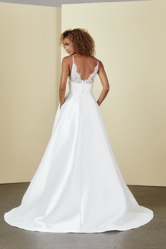 Smith, $2,795, dress from Collection Bridal by Nouvelle Amsale, Fabric: mikado
