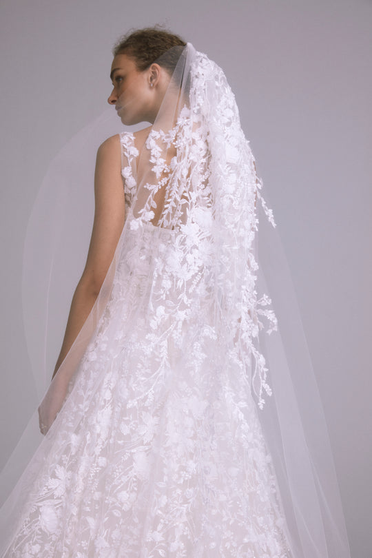 Yuna, $5,495, dress from Collection Bridal by Amsale, Fabric: faille