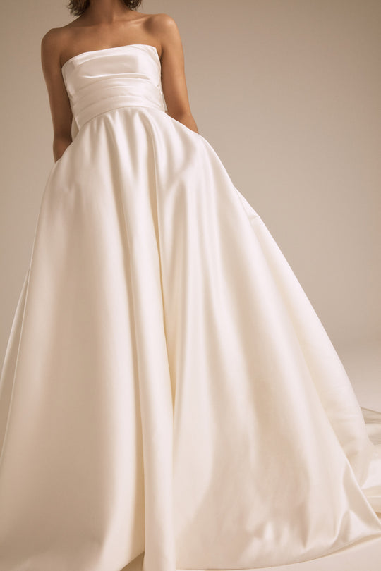 Atlas, $2,795, dress from Collection Bridal by Nouvelle Amsale, Fabric: duchess-satin