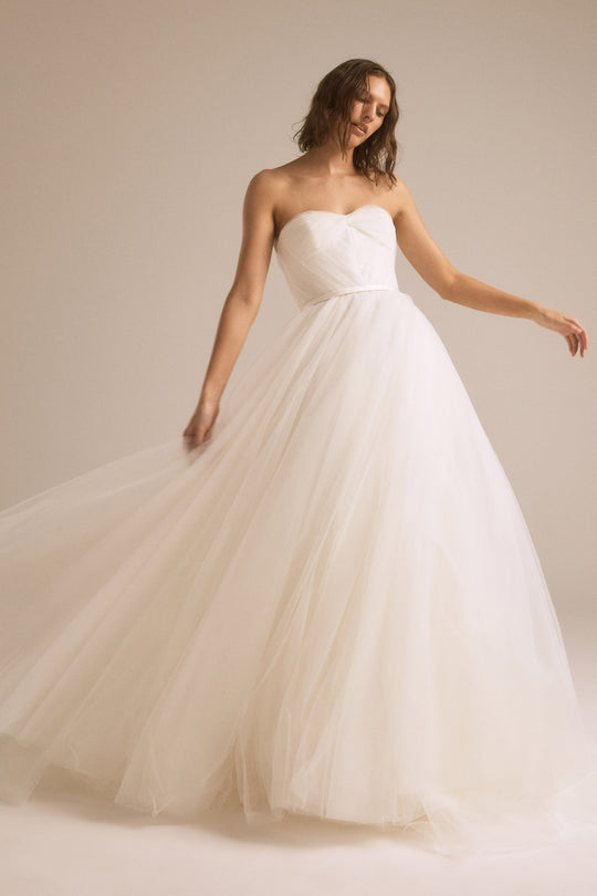 Harley, $2,695, dress from Collection Bridal by Nouvelle Amsale, Fabric: tulle