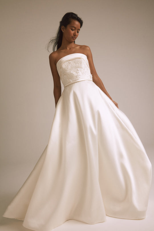 Miriam, $2,995, dress from Collection Bridal by Nouvelle Amsale, Fabric: mikado