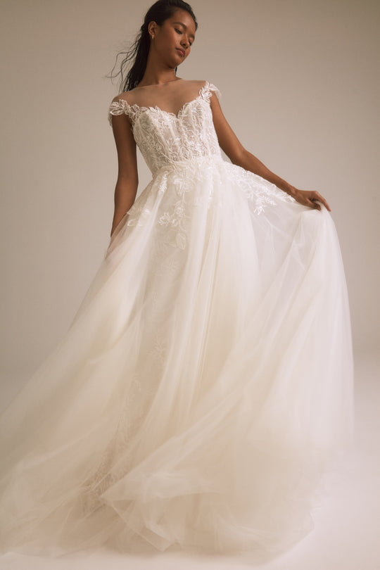 Pasha, $4,400, dress from Collection Bridal by Nouvelle Amsale, Fabric: floral-embellished-illusion-tulle
